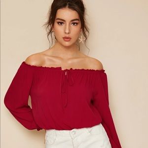 Off the shoulder top in red size small.